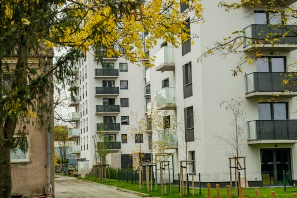 Multifamily apartment building showing multiple rental units for real estate investment opportunities and passive income generation
